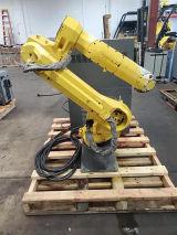 Fanuc boasts a payload capacity of 20 kg and a reach (2010)