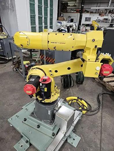 Fanuc is known for its robust performance in handling (2008)