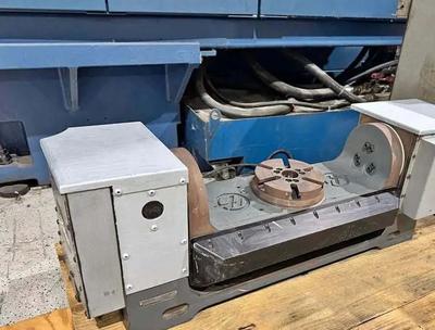 Haas of a Haas 5-axis dual-axis trunnion rotary table (2014)