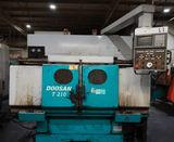 Doosan t 210 lta twin spindle cnc turning center (1999)