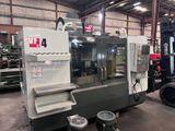 Haas vf 4 cnc vertical machining center w hrt 310 rotary 4th axis (2014)