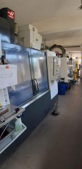 Haas 4 axis vertical machining centre (2011)