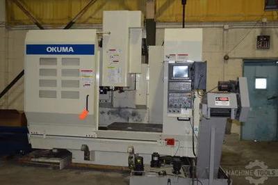 Okuma mc v4020 cnc vertical machining center w osp e100m coolant thru spindle 32 atc 40 taper 15k spindle low hours (2010)