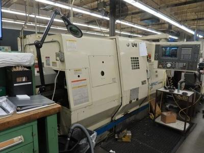 Okuma impact lu 15m cnc lathe (1996)